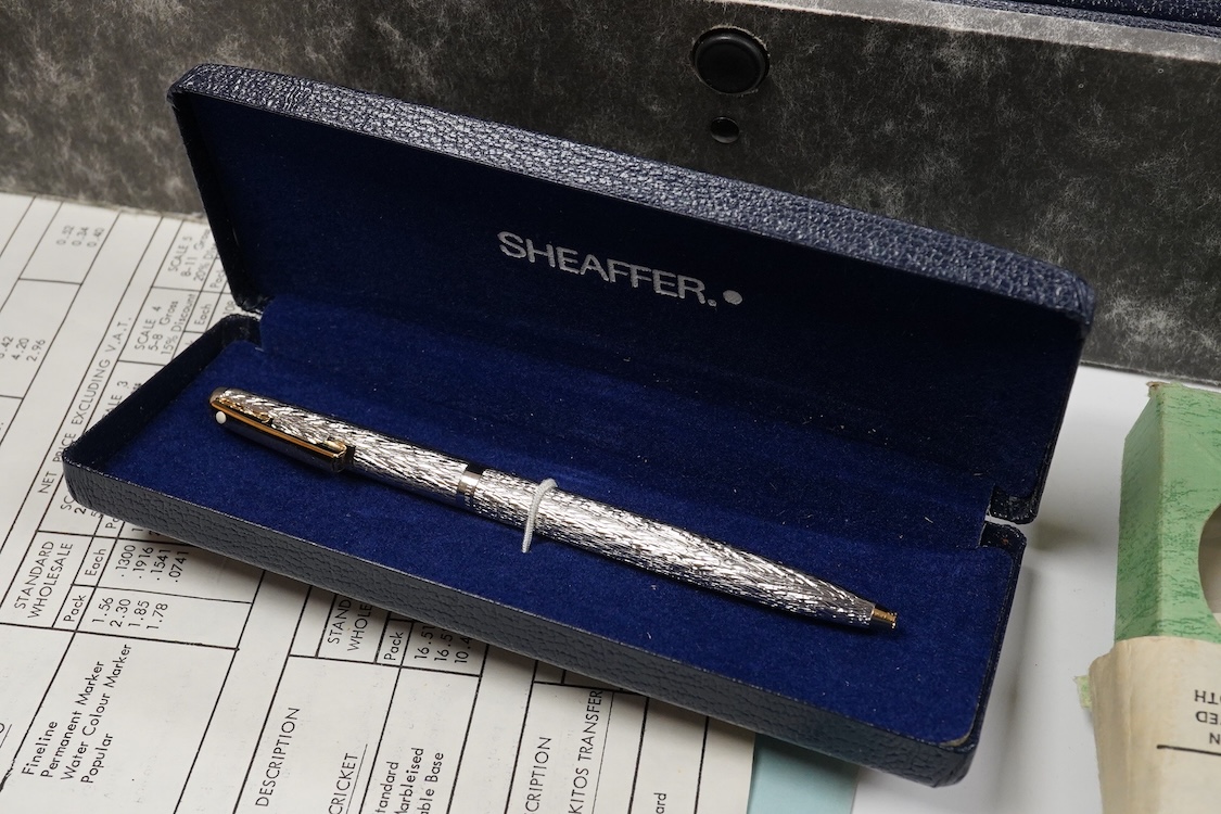 A folder of Parker and Sheaffer pens and ball pens, mostly boxed and a Parker Pen box containing eight items